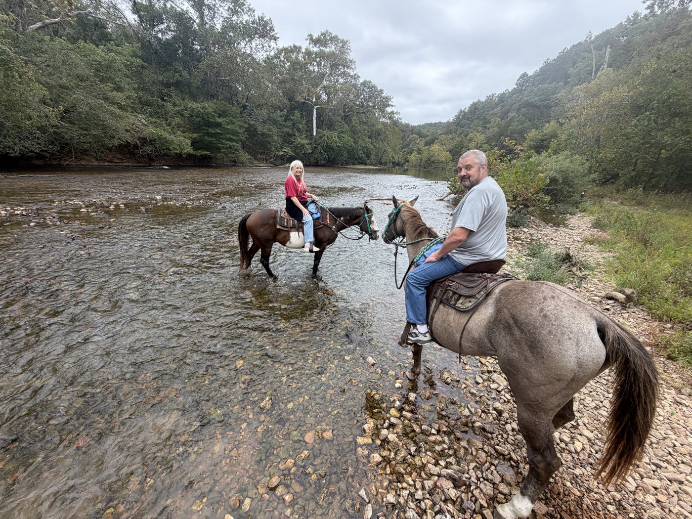 Riders crossing a creek